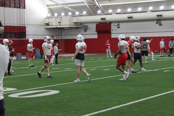 Hunter Wohler and Darryl Peterson walk between drills during practice.